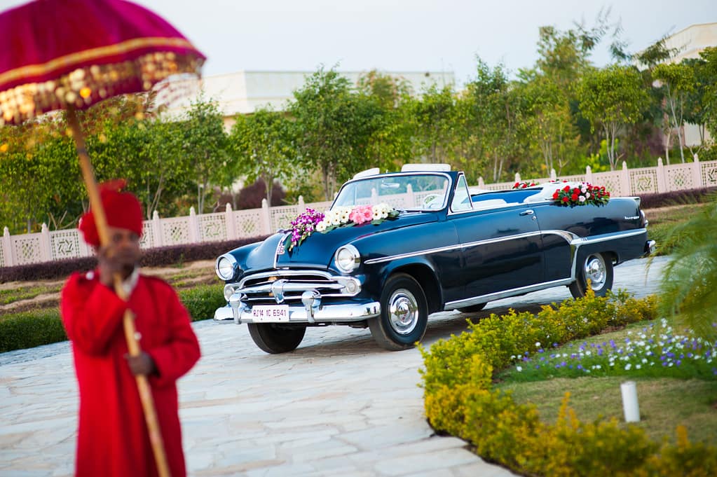 Groom entry by car 