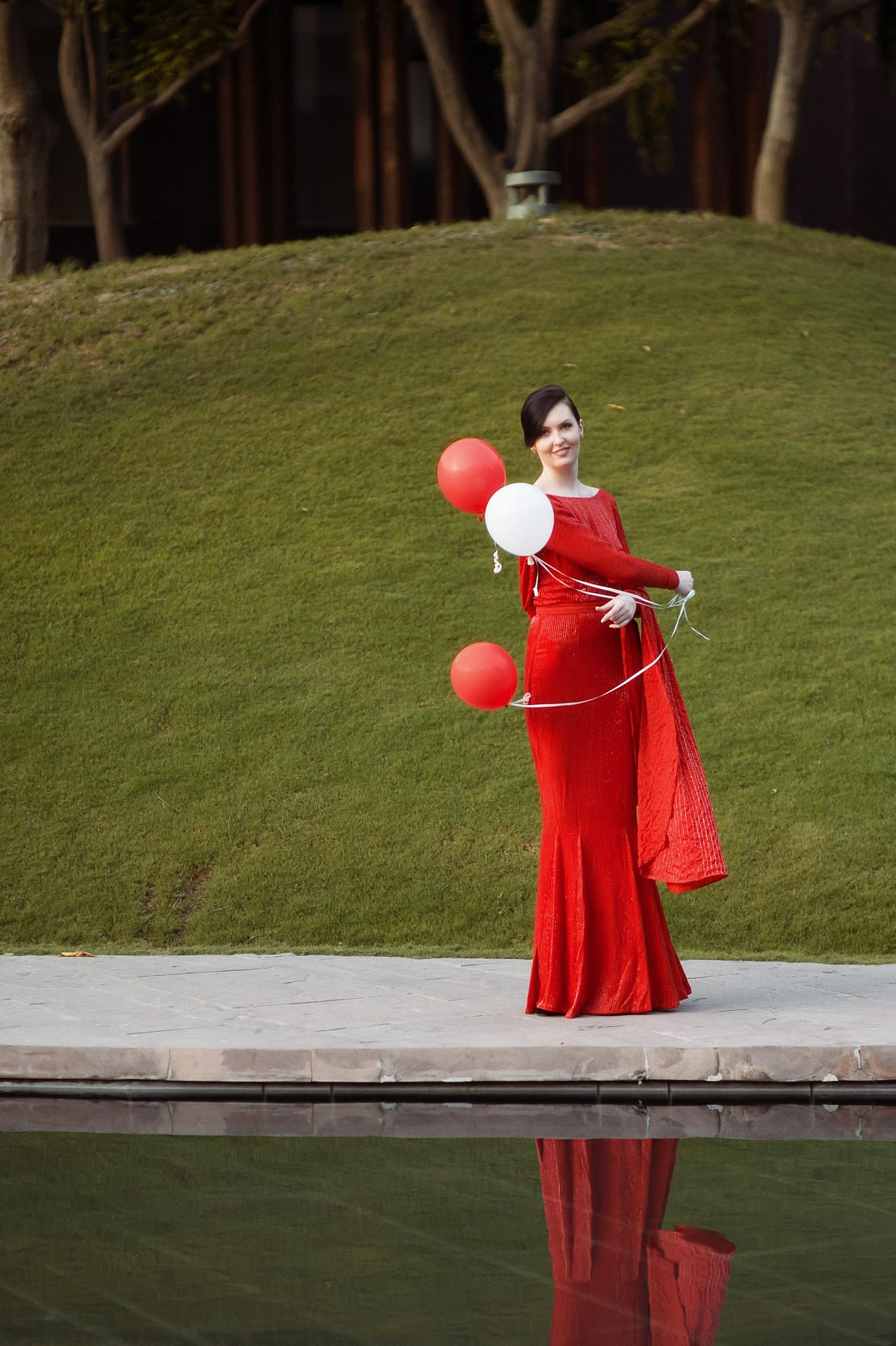 Bride in red dress pose 