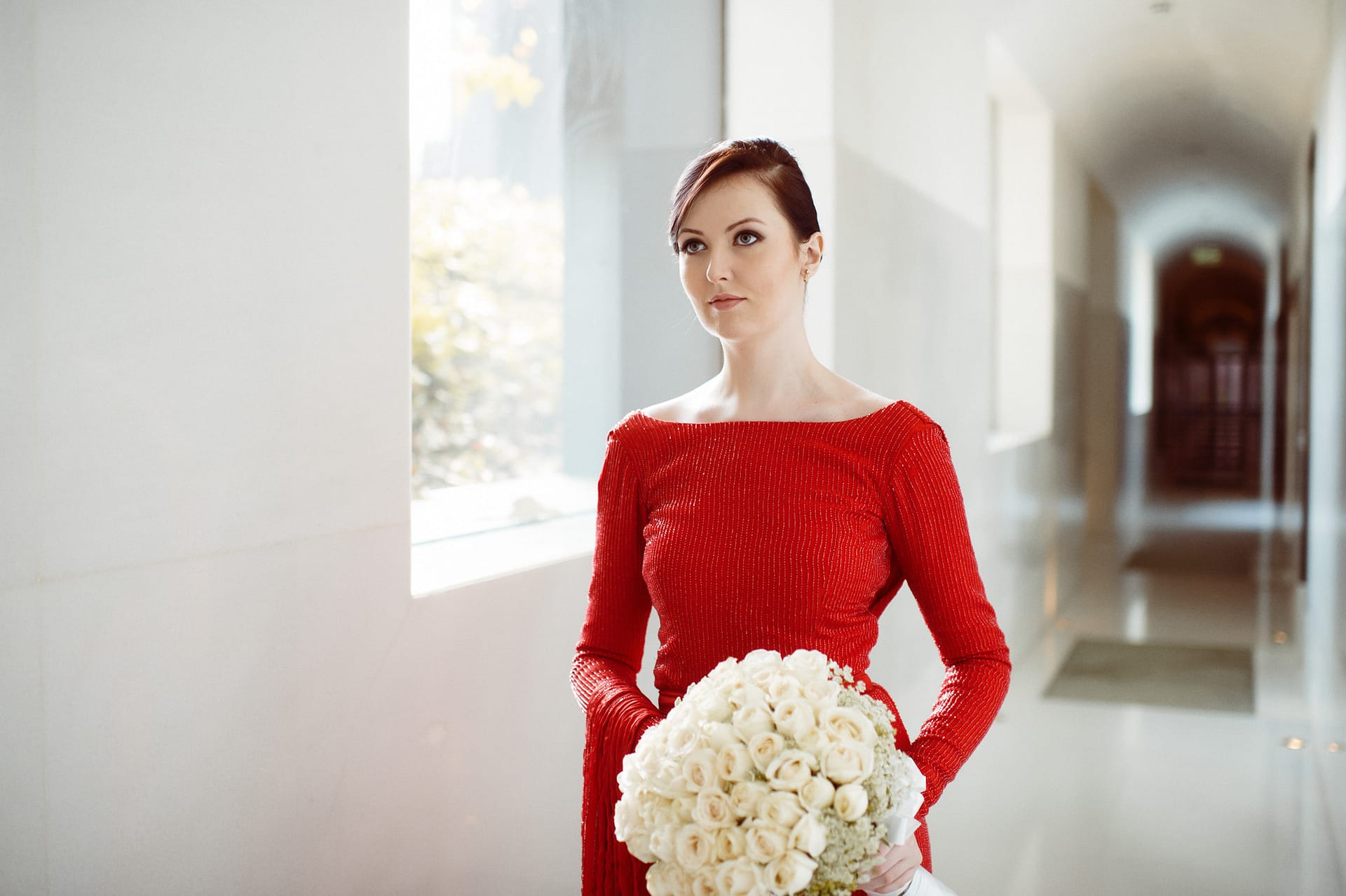 Bride walking with flowers